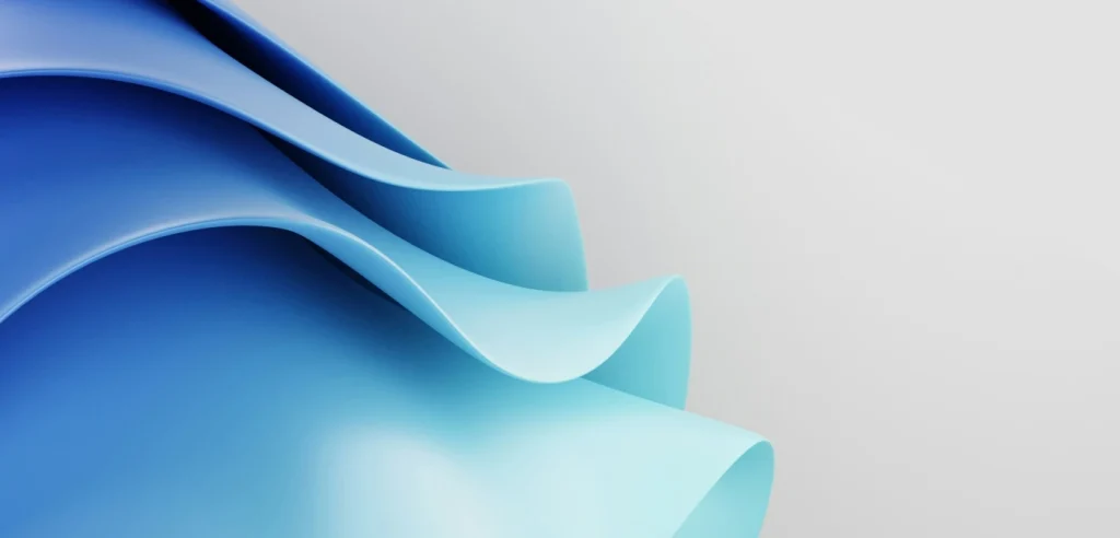 Abstract image of layered light blue curves on a neutral background, symbolising structure, clarity, and the foundational principles of responsible ai policy.